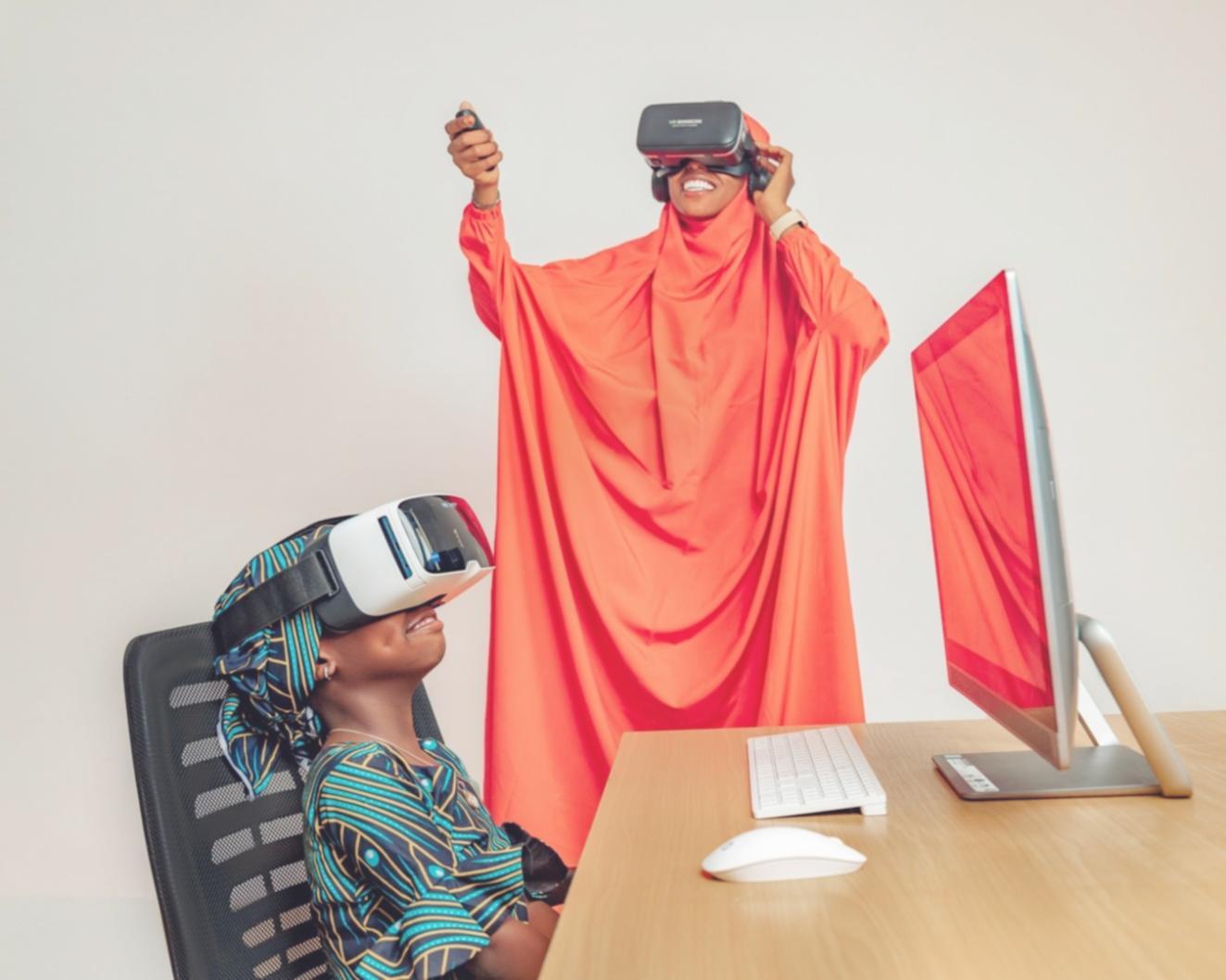 Student working on VR interface design project with spatial layout tools